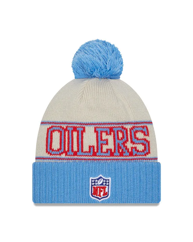 Houston Oilers New Era 2023 Sideline Historic Pom Cuffed Knit Hat - Cream/Baby Blue